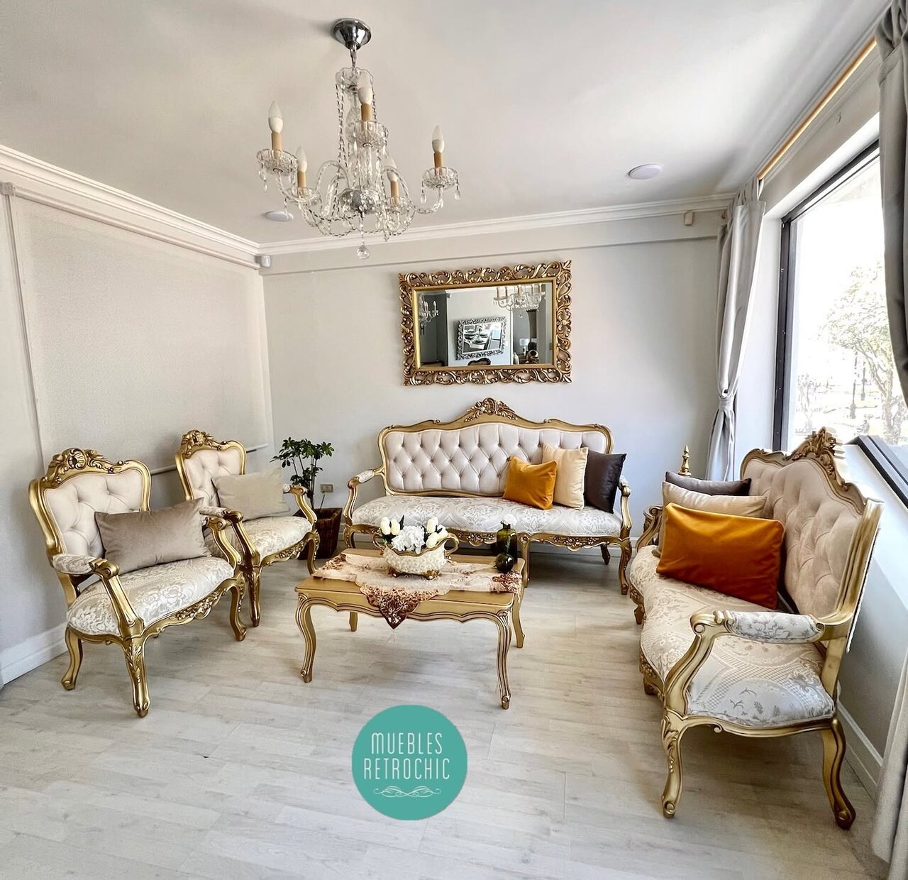 Ivory Louis XV living room with a tufted sofa and carved armchairs